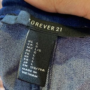 Dark blue denim skirt with pockets